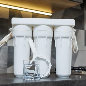 Ultraviolet light shining on water. UV light is used for disinfection, targeting bacteria, viruses, and pathogens.